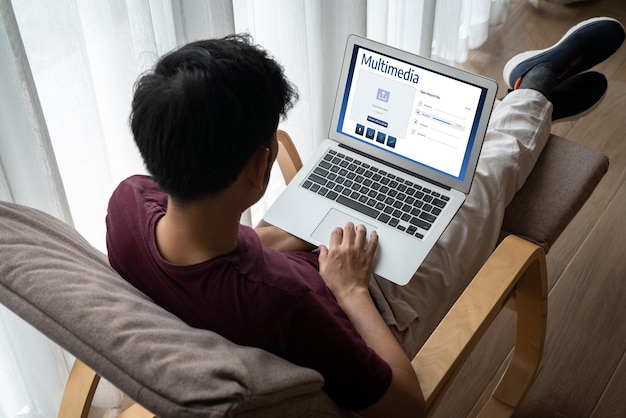 A person using a laptop to access a SNAP eligibility calculator website. The screen shows a simple form asking for household income and size, illustrating the ease of checking potential eligibility.