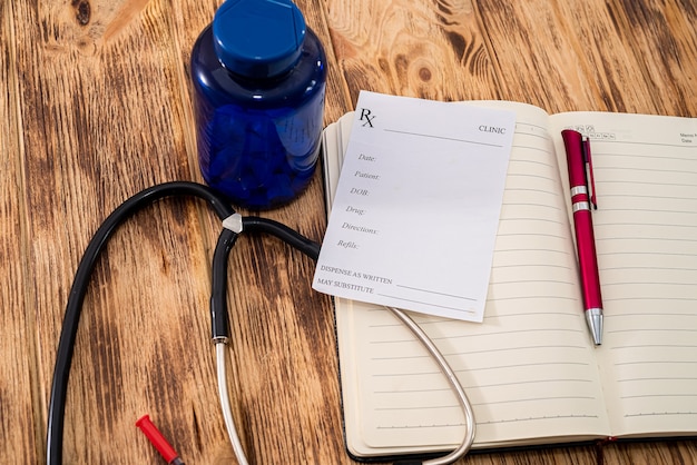A close-up shot of a Medicaid enrollment form with a pen resting on it, conveying the process of applying for expanded healthcare coverage.