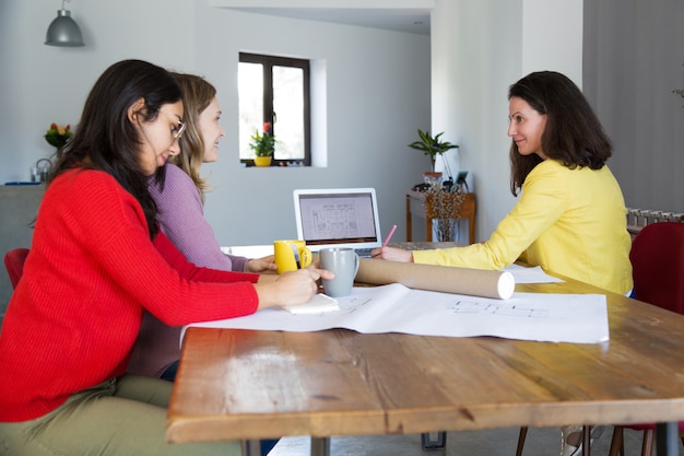 A person sitting at a desk, reviewing documents related to housing assistance, with a focused and determined expression. The image should convey the importance of understanding the eligibility criteria.