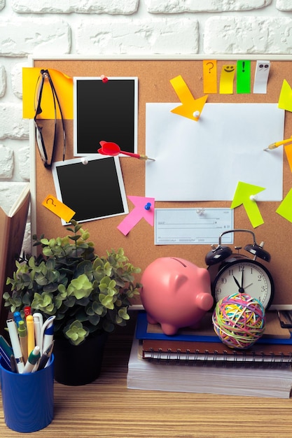 A vision board featuring pictures symbolizing different financial goals, such as a house, a vacation, and a retirement fund, set against a calendar marking the year 2025.