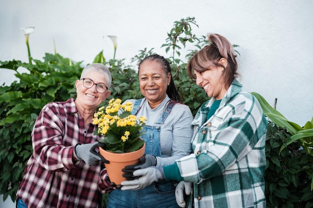 A diverse group of senior citizens smiling and engaged in various activities, such as gardening, reading, and playing board games, symbolizing a fulfilling retirement supported by Social Security benefits.