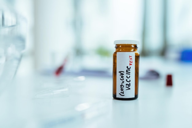 A close-up photo of a prescription medication bottle with a price tag on it, symbolizing the high cost of prescription drugs and the need for affordability changes in Medicare Part D.