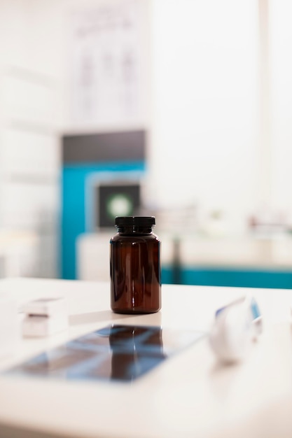 A close-up of a prescription drug bottle with the Medicare logo subtly in the background. The focus is on the bottle's label, hinting at medication coverage.